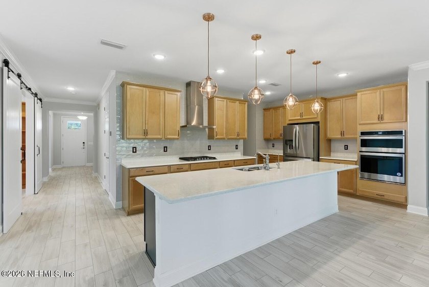 Welcome to this beautifully upgraded home in WaterSong at - photo 11
