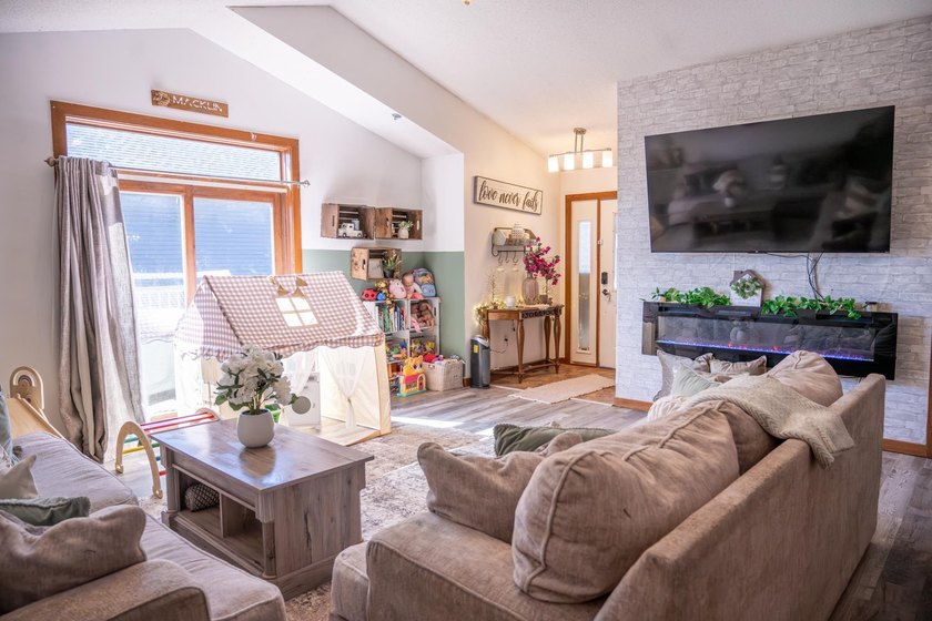 Each unit features a spacious, open~concept layout where the - photo 12