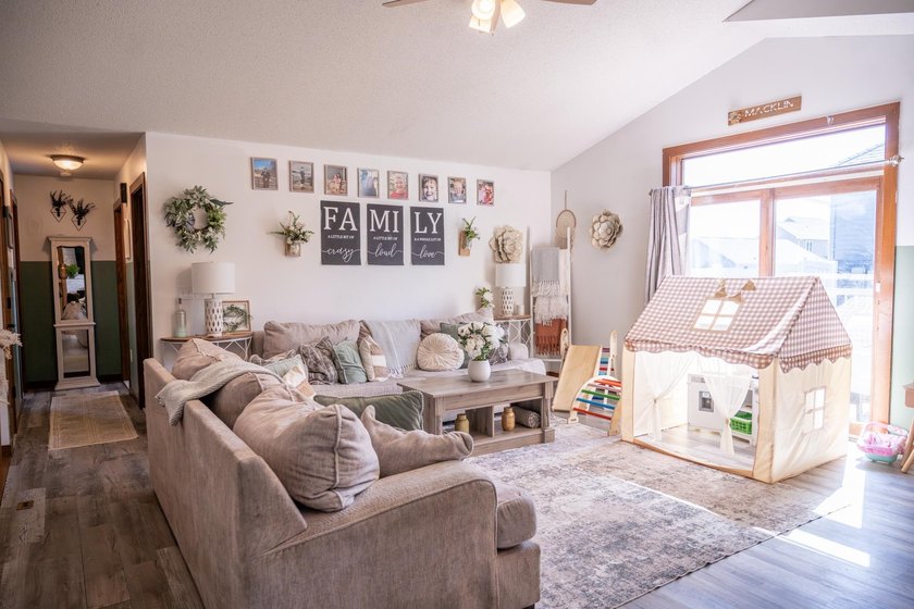 Each unit features a spacious, open~concept layout where the - photo 13