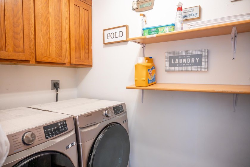 Each unit features a spacious, open~concept layout where the - photo 24