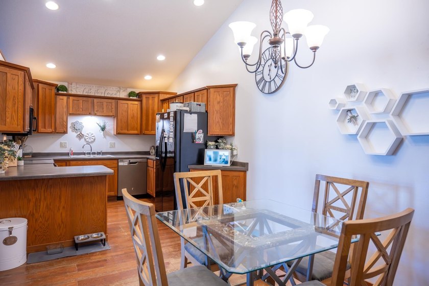 Each unit features a spacious, open~concept layout where the - photo 41