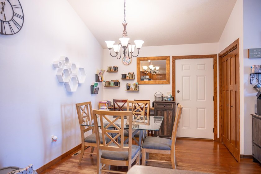 Each unit features a spacious, open~concept layout where the - photo 42