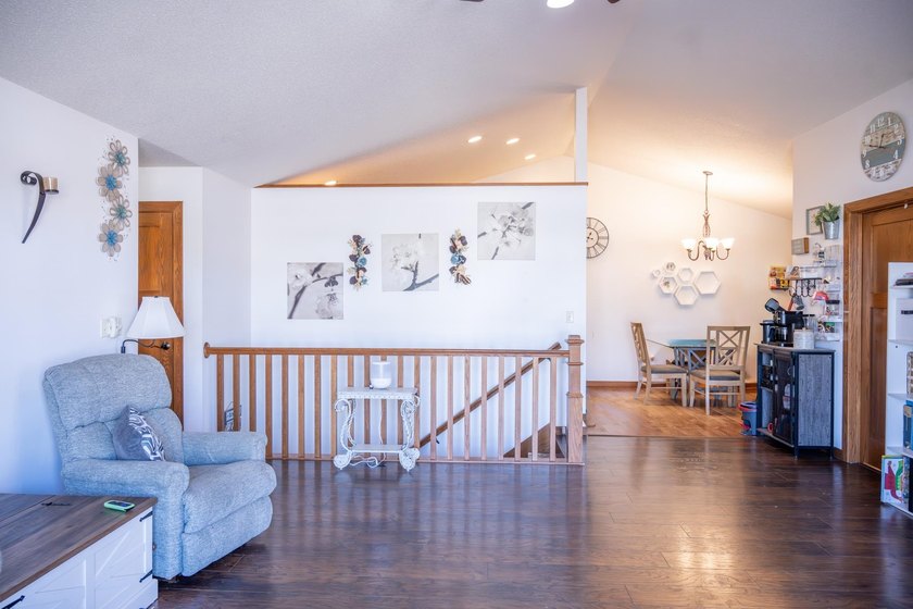 Each unit features a spacious, open~concept layout where the - photo 43