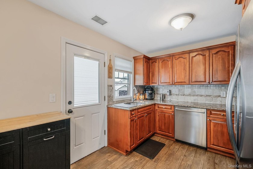 Welcome to 253 E Riviera Drive a charming expanded Cape-style - photo 9