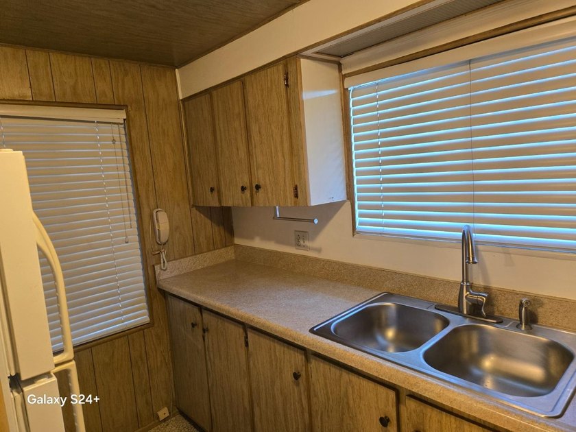 2 bedroom, 1 bathroom mobile home with an expando. Located in - photo 16