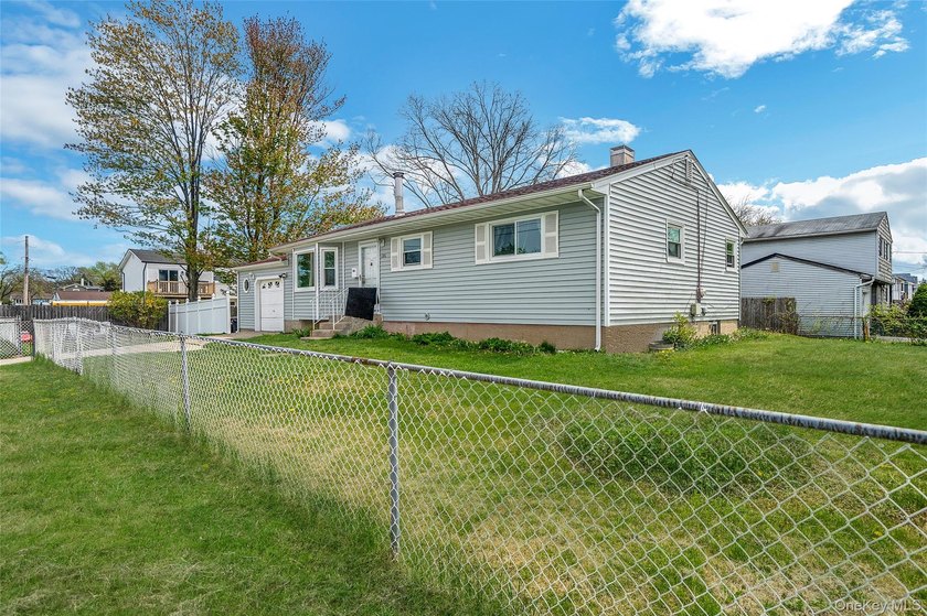Welcome to this charming ranch-style home situated on a - photo 3