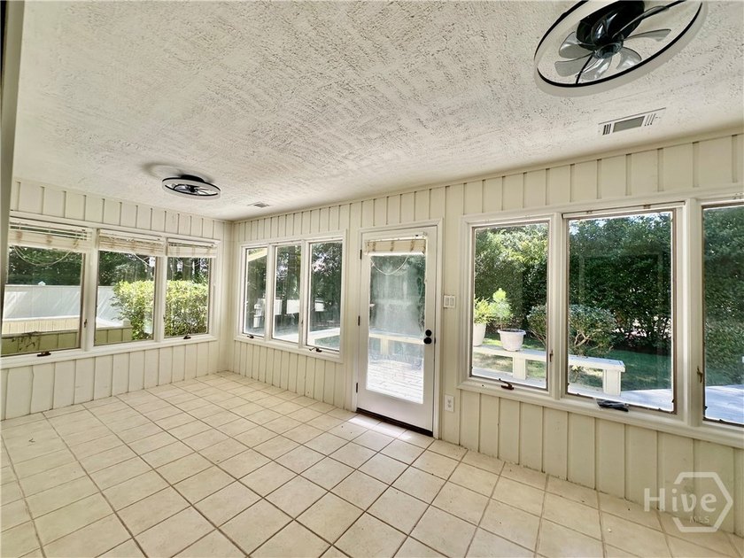 Experience the best of gated island living in this charming - photo 16