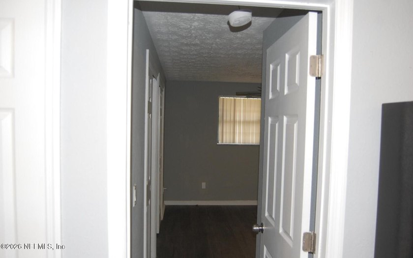 Step into this cozy 3-bedroom, 3-bathroom home nestled in a - photo 11