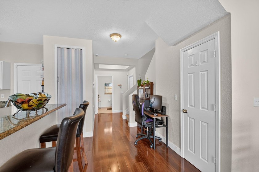 Welcome to this WATERFRONT END UNIT TOWNHOME in Emerald Lakes of - photo 13