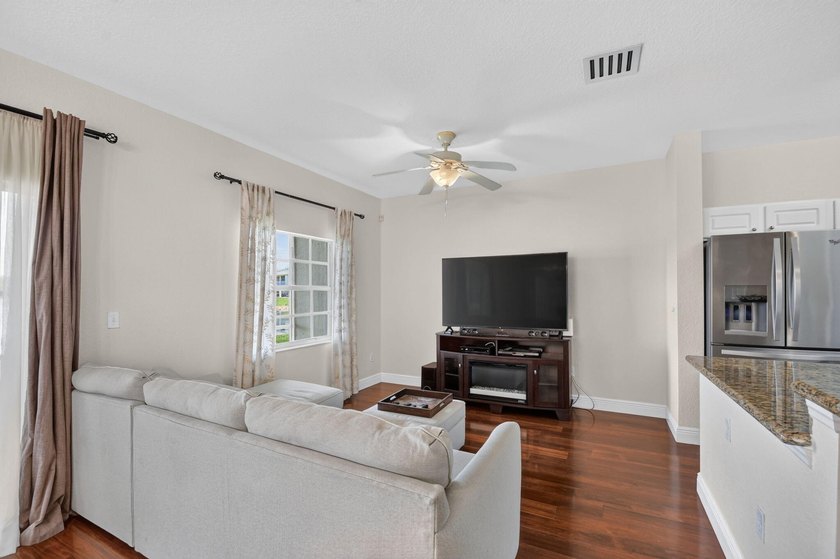 Welcome to this WATERFRONT END UNIT TOWNHOME in Emerald Lakes of - photo 21