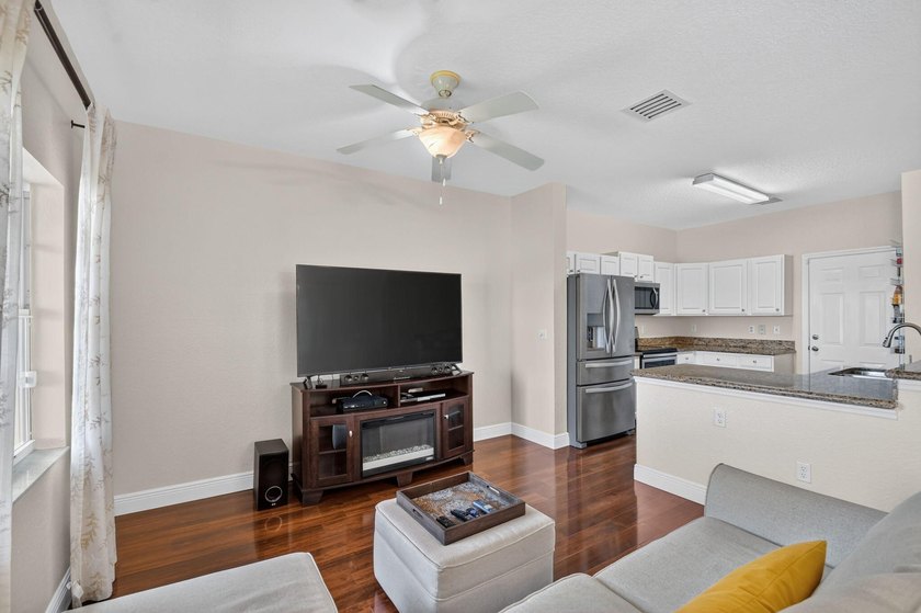Welcome to this WATERFRONT END UNIT TOWNHOME in Emerald Lakes of - photo 22