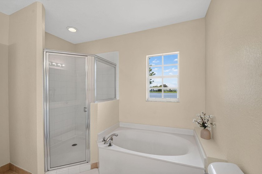 Welcome to this WATERFRONT END UNIT TOWNHOME in Emerald Lakes of - photo 34