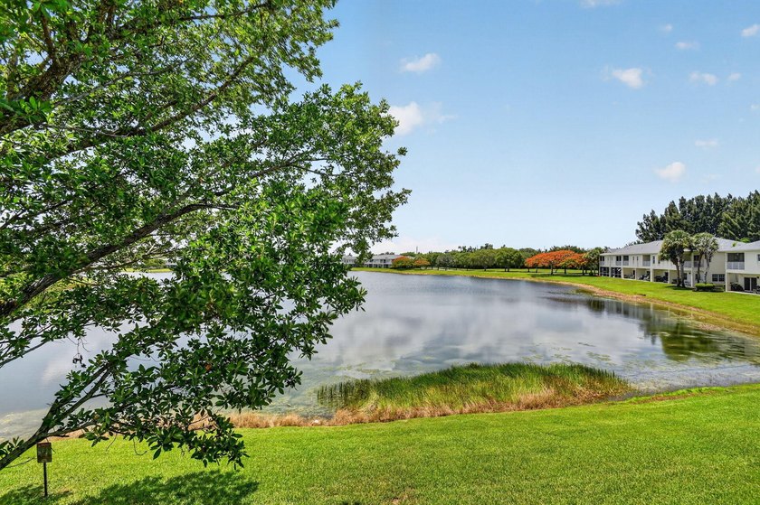 Welcome to this WATERFRONT END UNIT TOWNHOME in Emerald Lakes of - photo 42