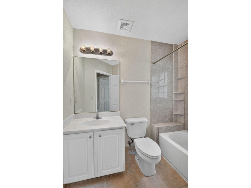 Welcome to this WATERFRONT END UNIT TOWNHOME in Emerald Lakes of - photo 48