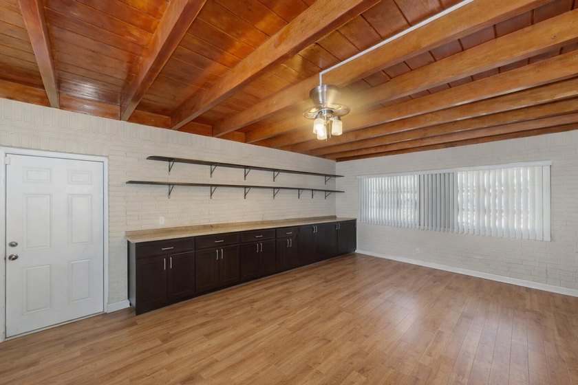 Welcome to this beautifully refreshed pool home located in the - photo 3