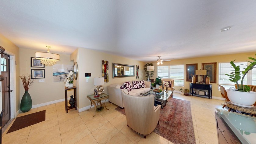 Welcome to this beautifully refreshed pool home located in the - photo 7
