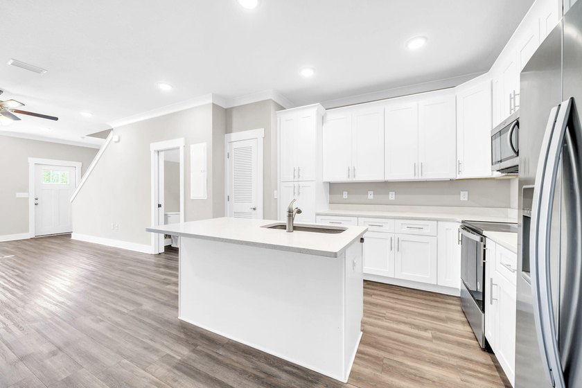 Affordable 3BR / 2.5 BA open floor plan that backs up to the - photo 9