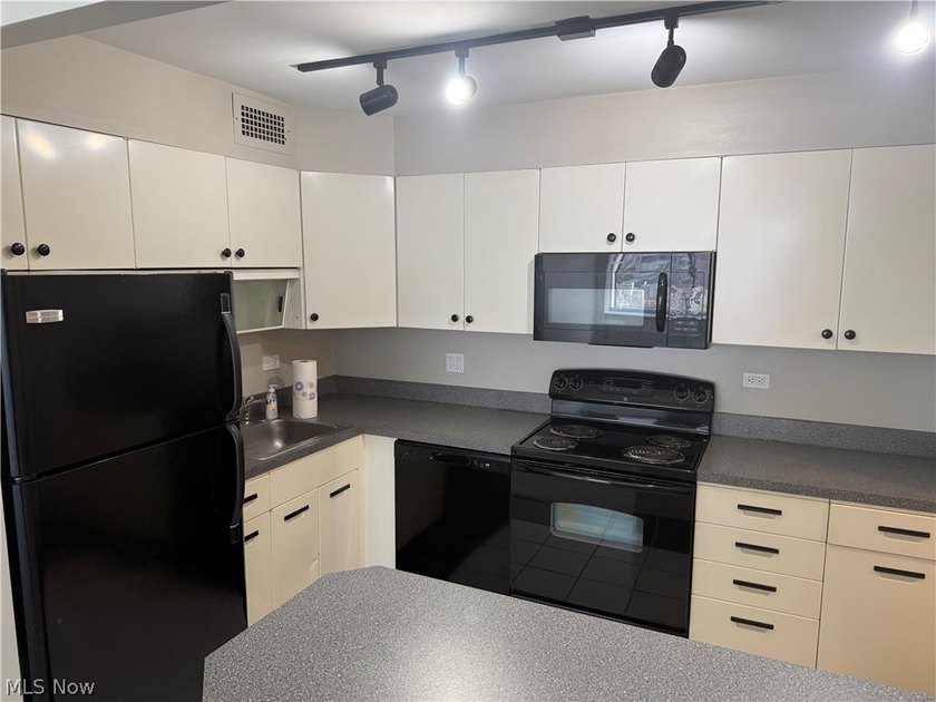 Welcome to Unit 504 at Winton Place, a bright and - photo 5