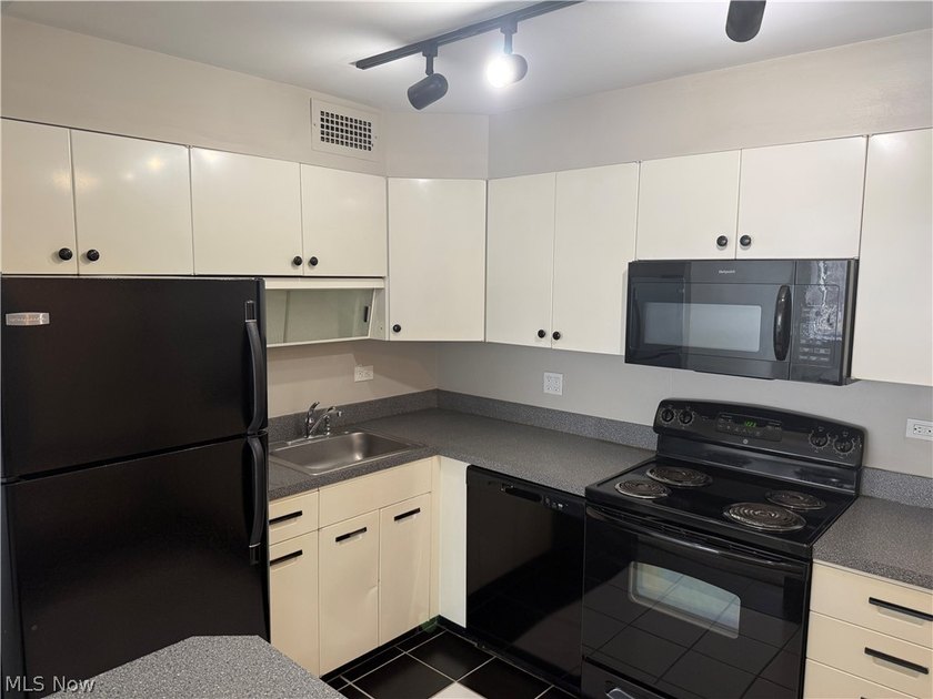 Welcome to Unit 504 at Winton Place, a bright and - photo 6
