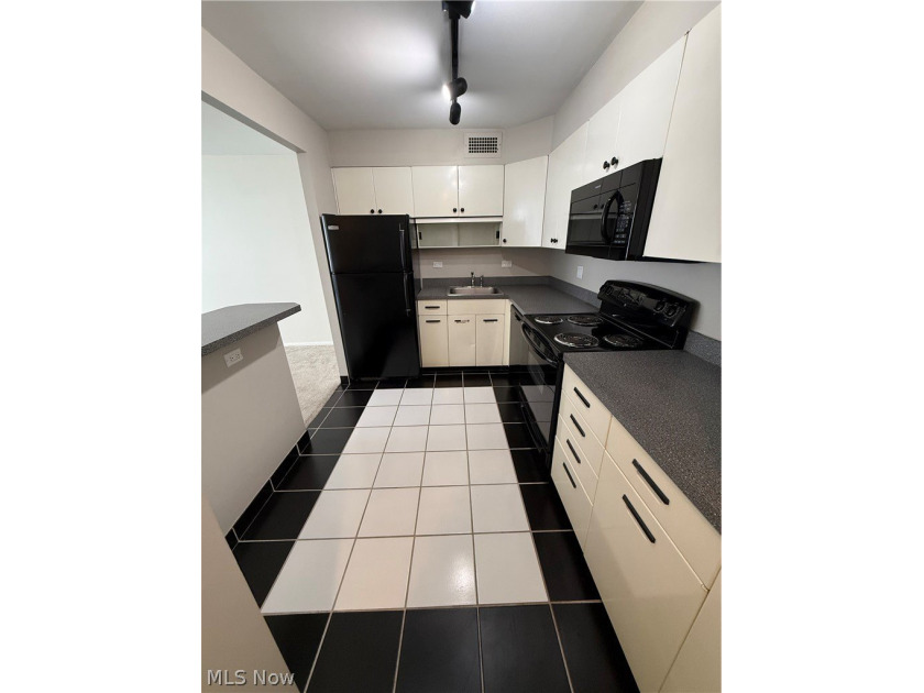 Welcome to Unit 504 at Winton Place, a bright and - photo 8