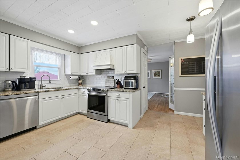 Welcome to this beautifully updated home in Crab Meadow where - photo 12