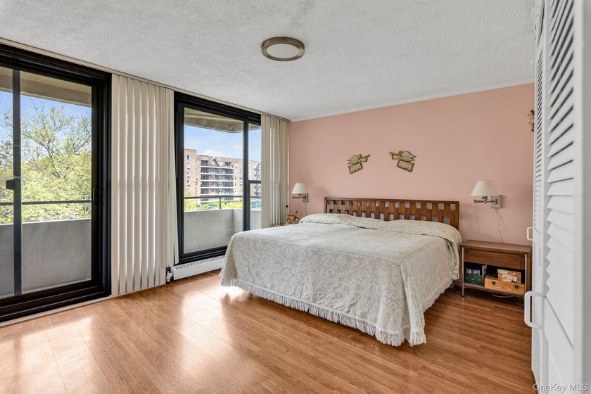 Bright and airy open concept layout with stunning wall of - photo 7