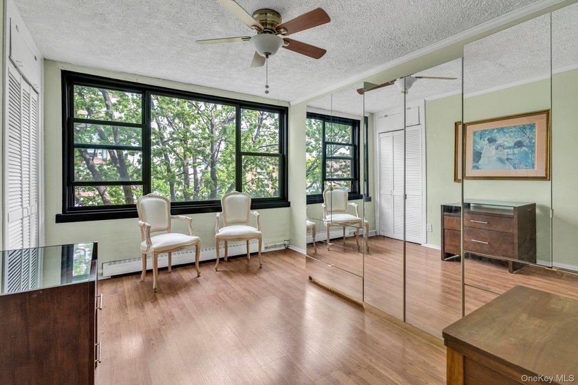 Bright and airy open concept layout with stunning wall of - photo 10