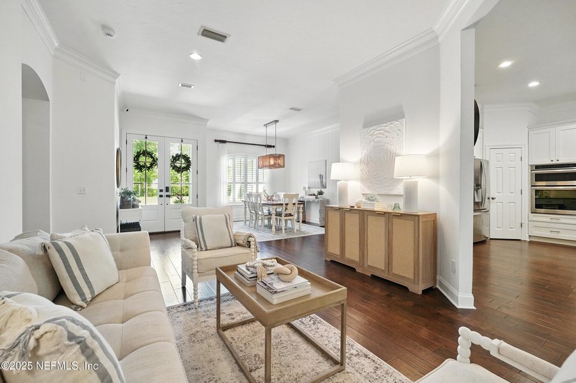 Nestled on a private 1.67-acre estate across from the - photo 11