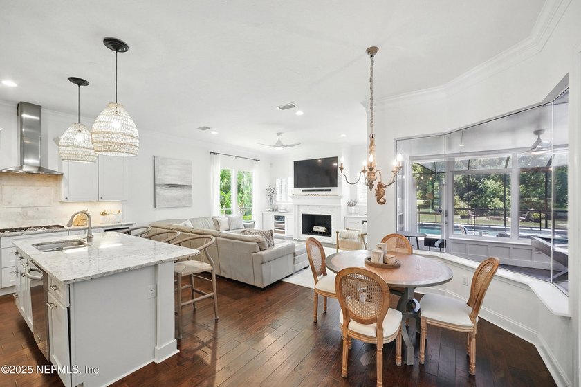 Nestled on a private 1.67-acre estate across from the - photo 14