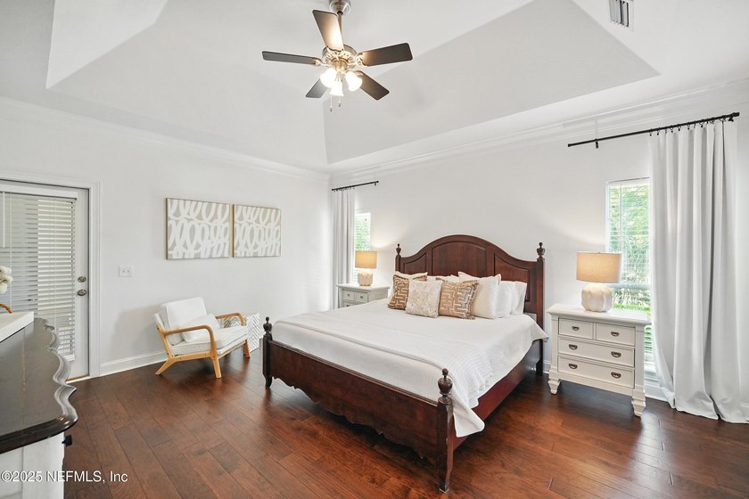 Nestled on a private 1.67-acre estate across from the - photo 26
