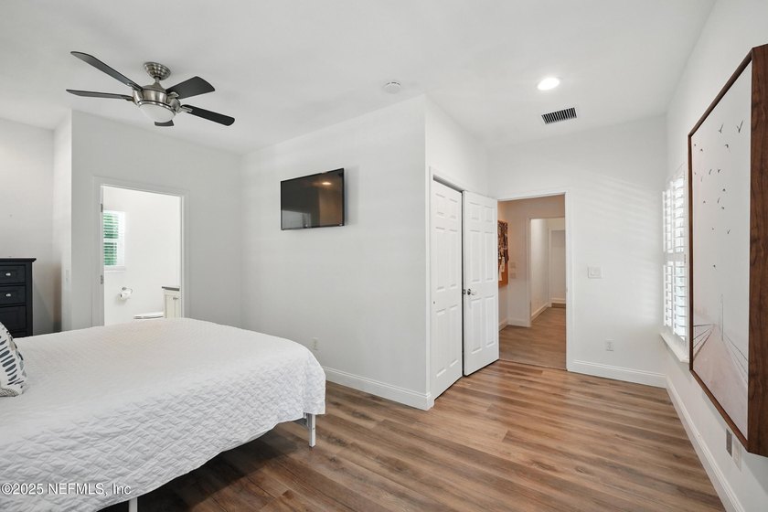 Nestled on a private 1.67-acre estate across from the - photo 34