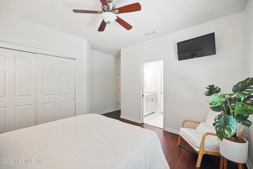 Nestled on a private 1.67-acre estate across from the - photo 38