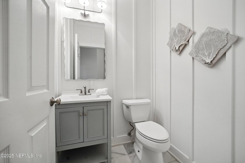 Nestled on a private 1.67-acre estate across from the - photo 44
