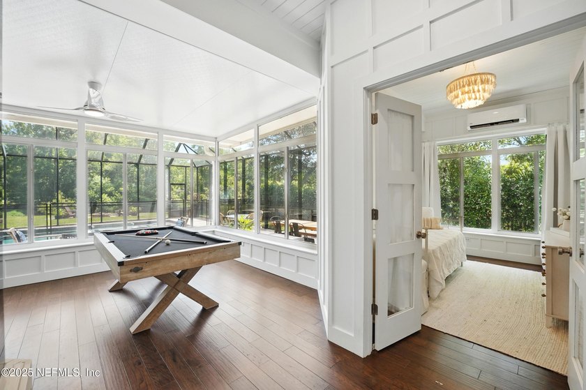 Nestled on a private 1.67-acre estate across from the - photo 46