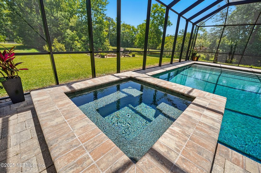 Nestled on a private 1.67-acre estate across from the - photo 55