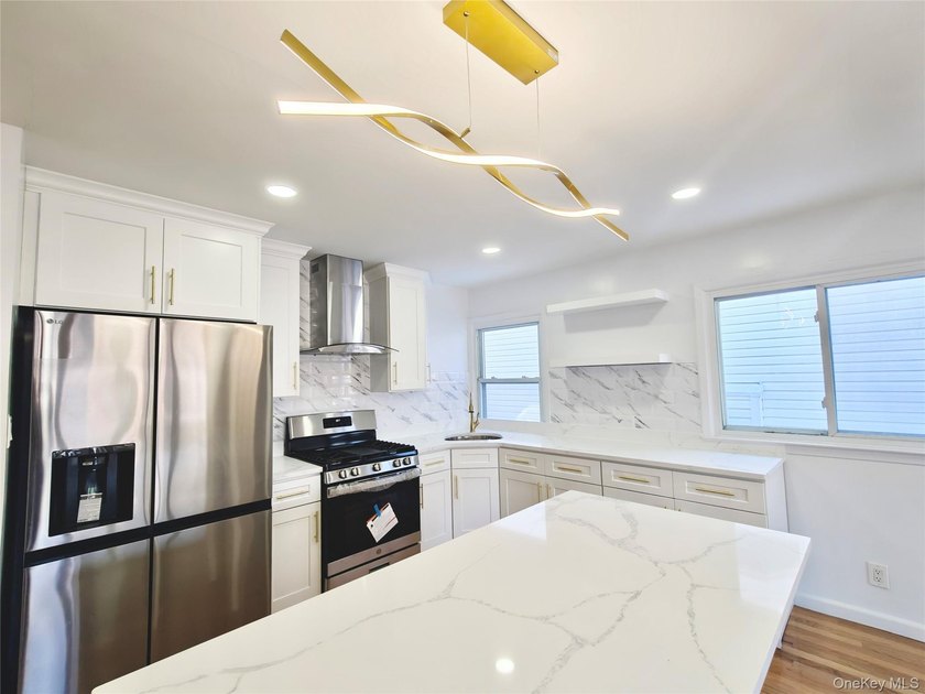 Beautifully renovated detached single-family home located in the - photo 12