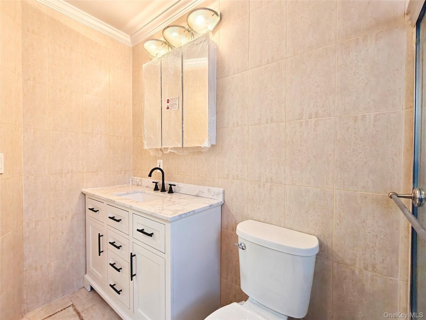 Beautifully renovated detached single-family home located in the - photo 17