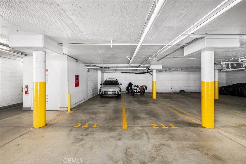 Welcome to Unit 311 at Pars Plaza, a beautifully maintained - photo 47
