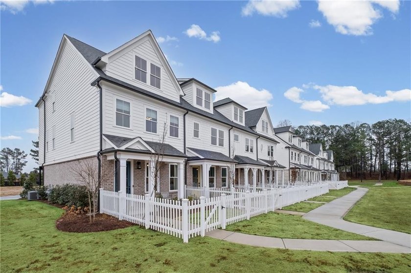 Welcome to The Village! A brand new luxury Townhome Neighborhood - photo 2
