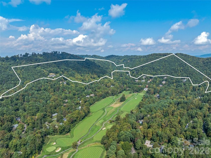 Set across 105.65 acres of pristine mountain landscape, this - photo 3
