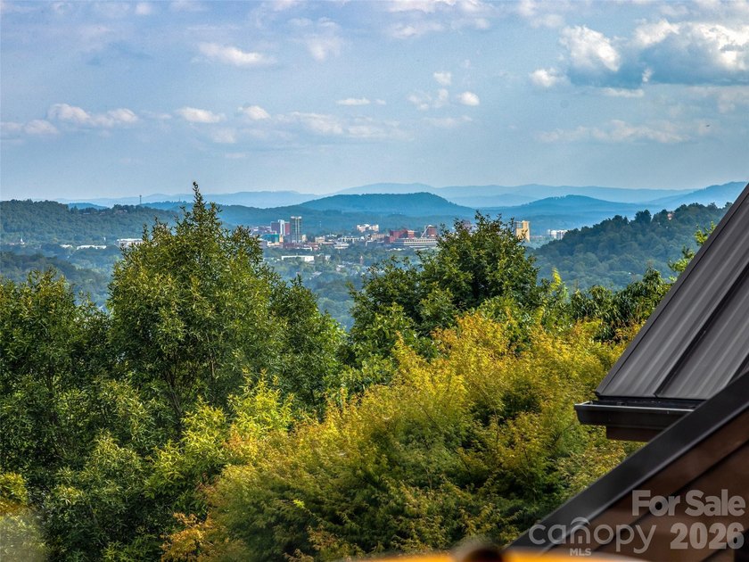 Set across 105.65 acres of pristine mountain landscape, this - photo 4