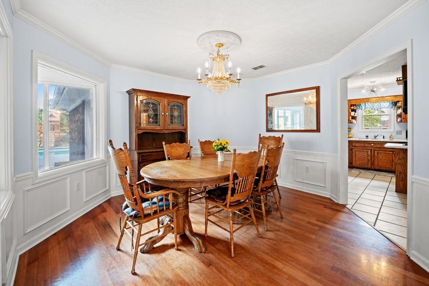Custom built all-brick home, with a large private pool, on a - photo 11