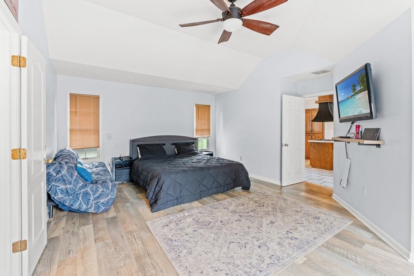 Custom built all-brick home, with a large private pool, on a - photo 16