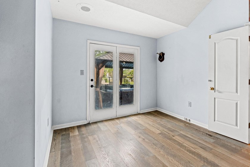 Custom built all-brick home, with a large private pool, on a - photo 18