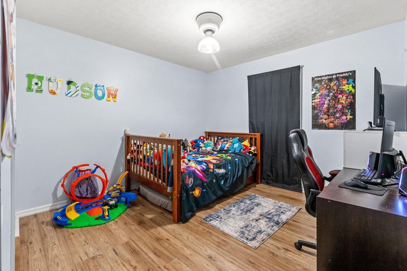 Custom built all-brick home, with a large private pool, on a - photo 25