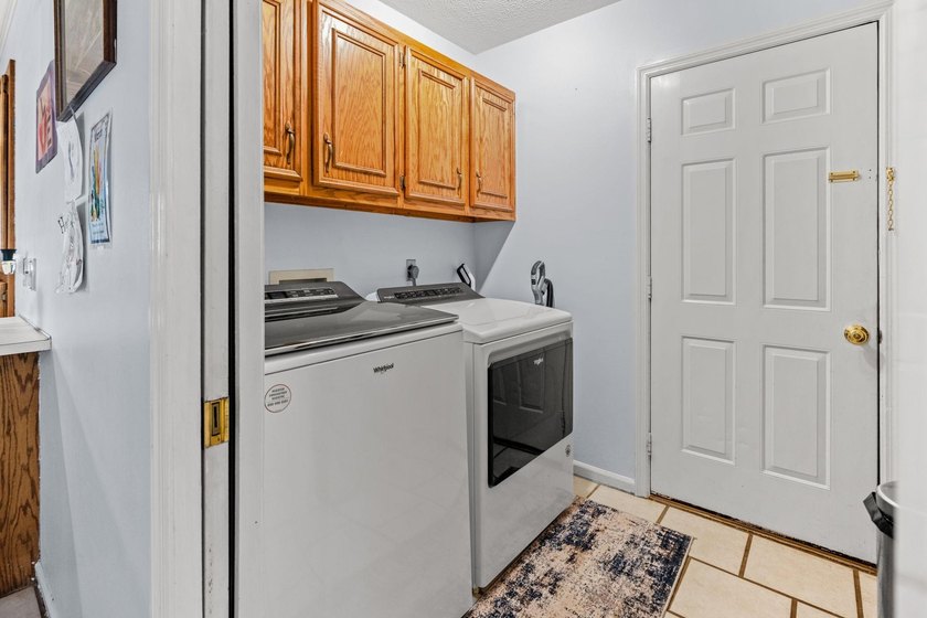 Custom built all-brick home, with a large private pool, on a - photo 26