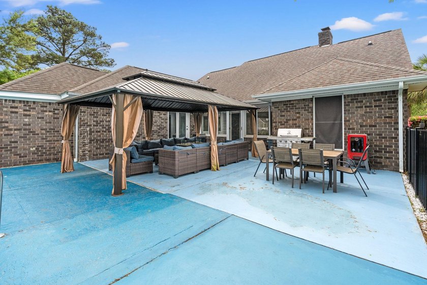 Custom built all-brick home, with a large private pool, on a - photo 29