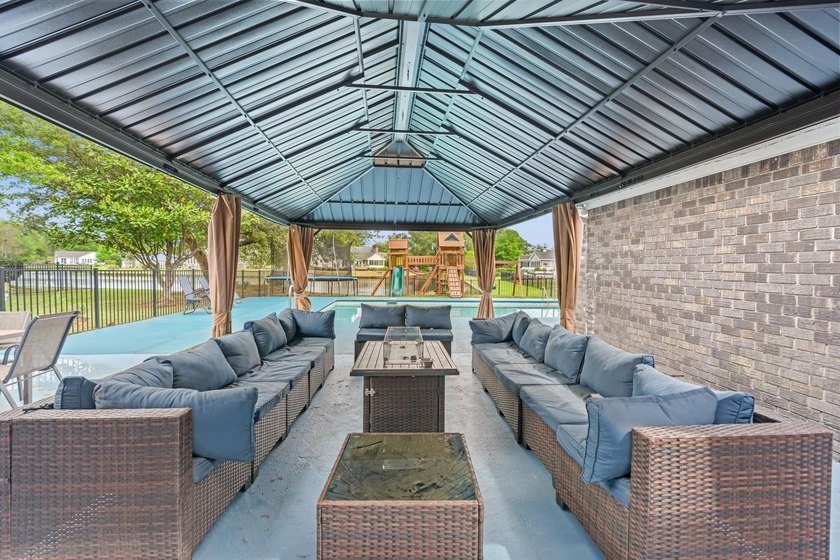 Custom built all-brick home, with a large private pool, on a - photo 30