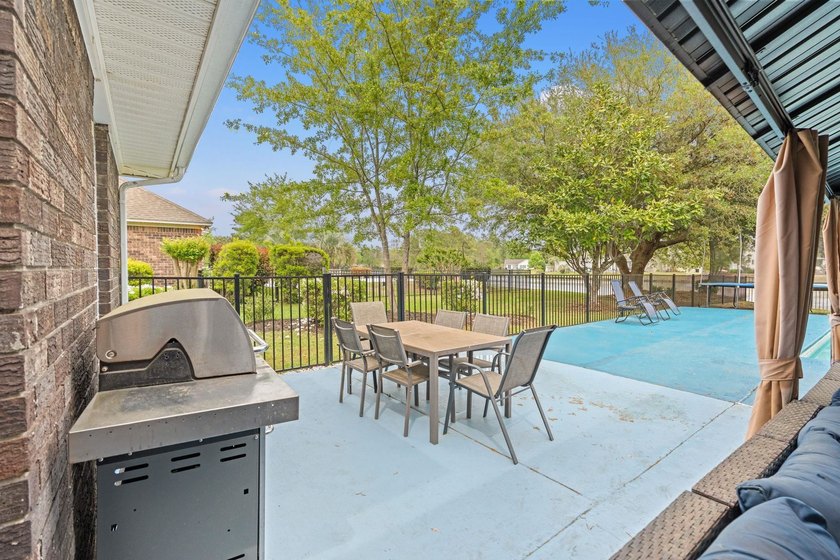 Custom built all-brick home, with a large private pool, on a - photo 31