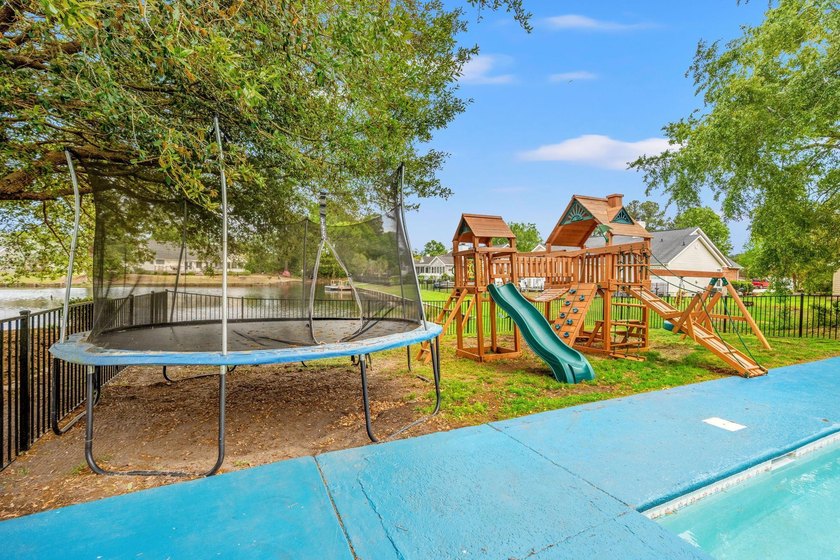 Custom built all-brick home, with a large private pool, on a - photo 34